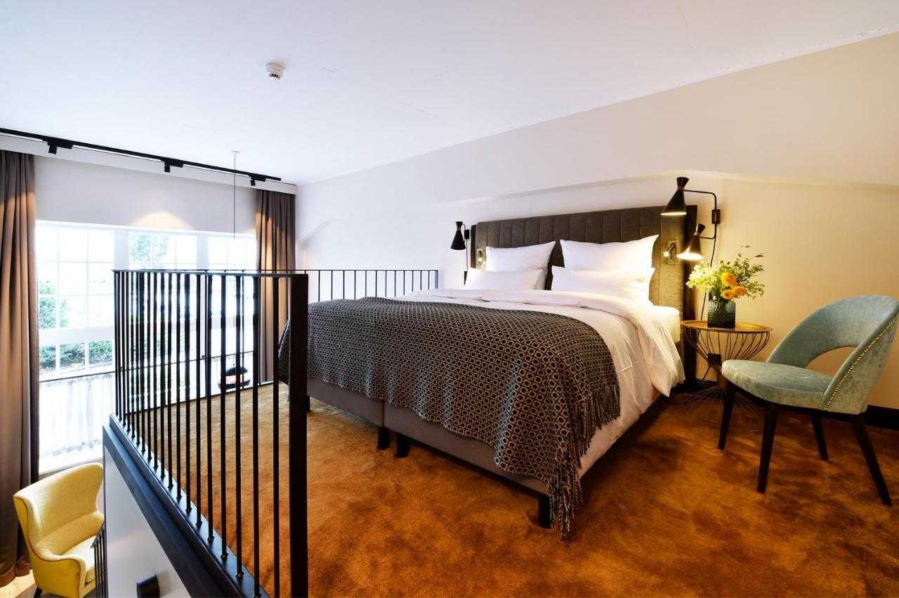 Das James Flensburg Bagian luar foto A bedroom at the hotel
